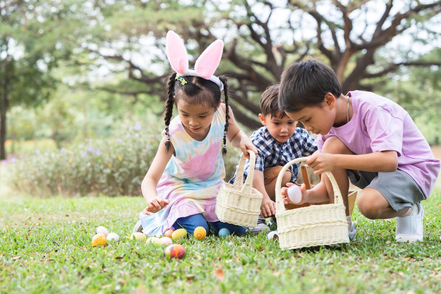 Kids find eggs on an Easter egg hunt