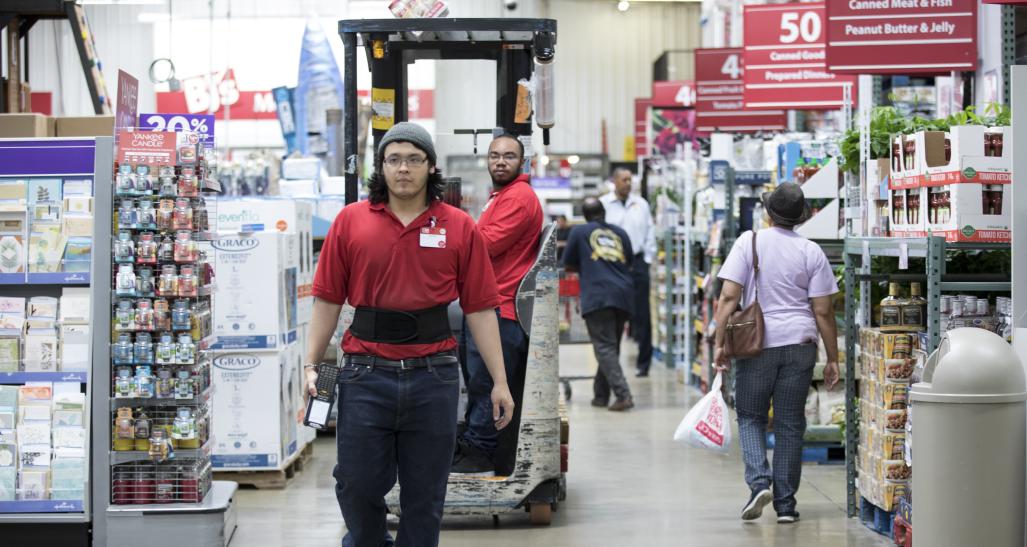 Employees working in warehouse store