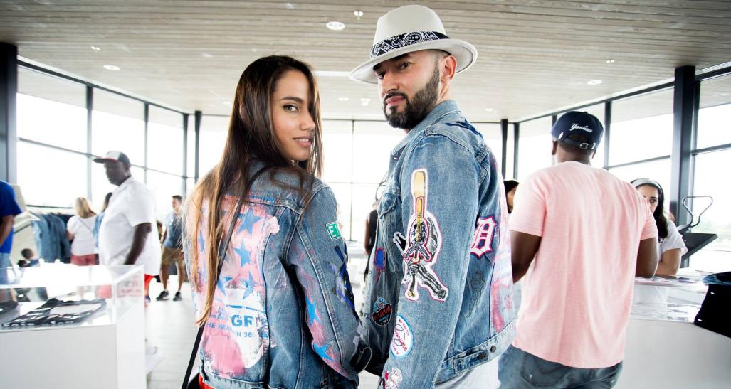 Two people pose for a picture in their Levis jean jackets