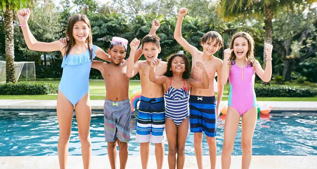 a group of children pose in their swimsuits from kidbox