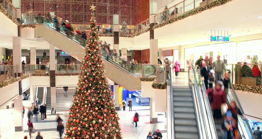 mall is shown during holiday season with christmas tree