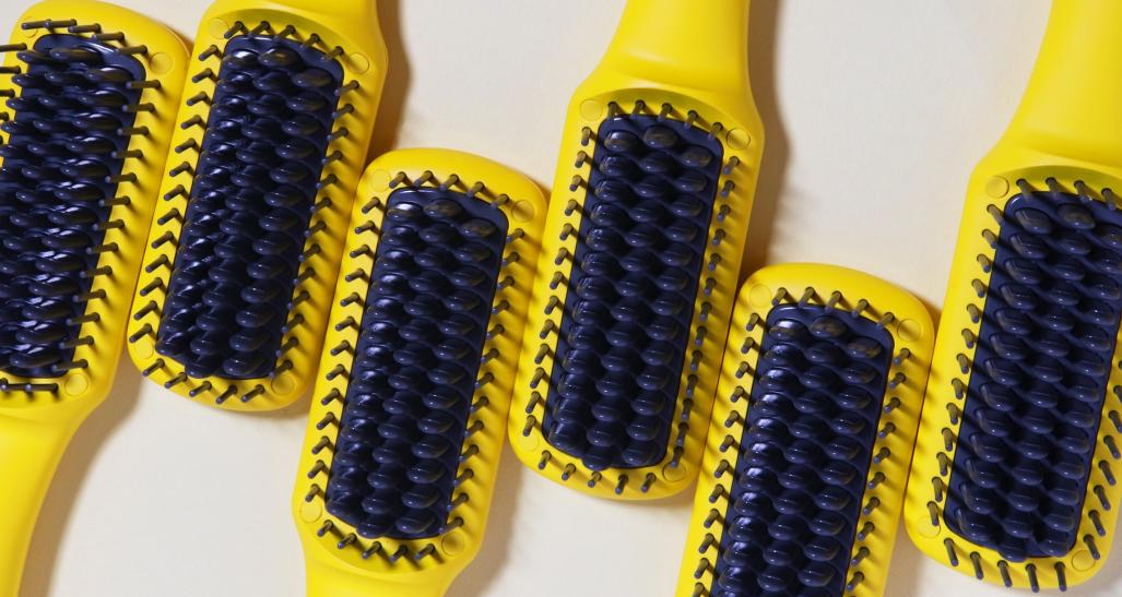 Yellow Drybar hair brushes