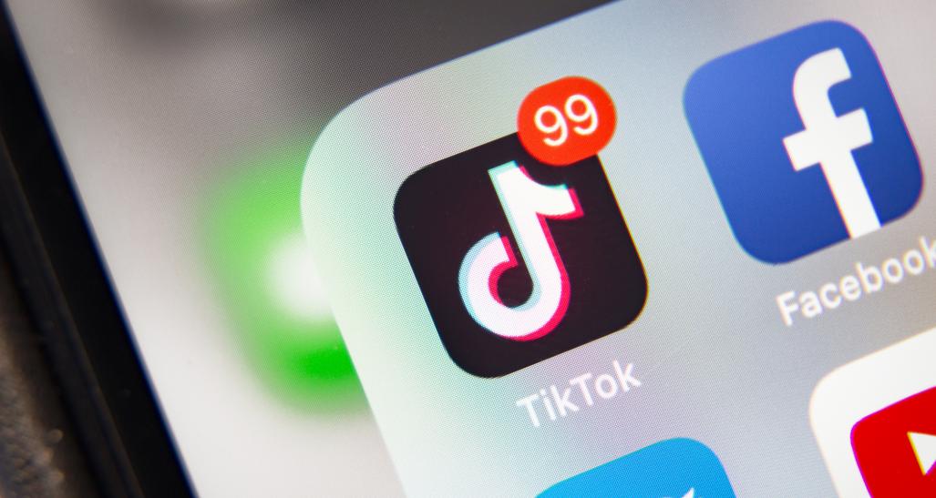 TikTok icon on phone screen