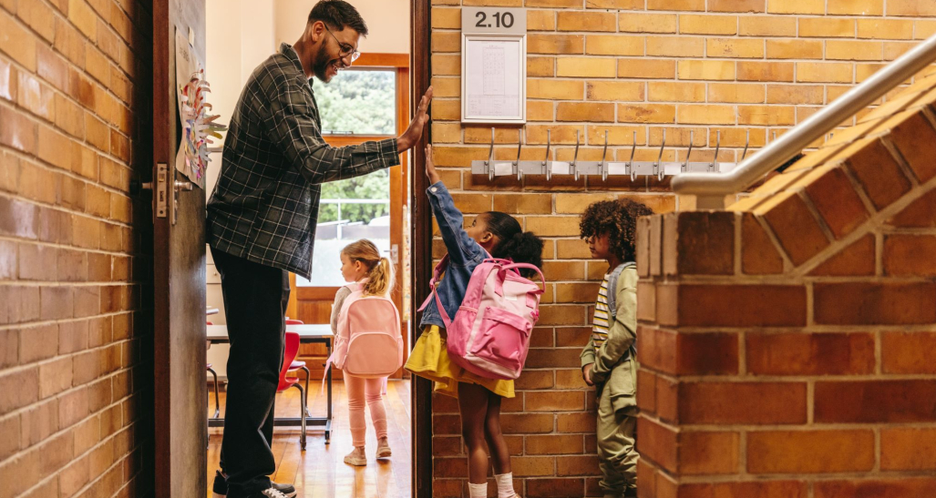 Children entering their classroom. 