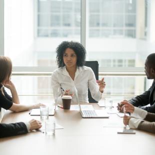 Woman leading meeting