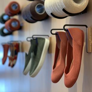 Rothy's shoes hanging on the wall in San Francisco store