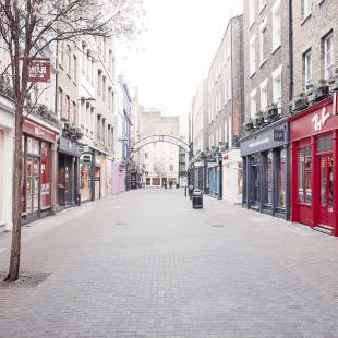 Empty shop-lined London street