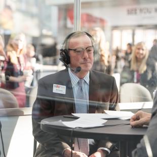 NRF's Bill Thorne records a podcast episode at Retail's Big Show