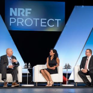 David Johnston, Juliette Kayyem and Jonathan Wackrow speaking at NRF PROTECT.