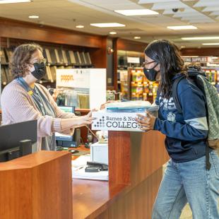 Two women having a conversation at Barnes and Noble College Store