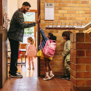 Children entering their classroom. 