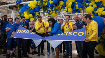 Javier Quiñones, CEO and chief sustainability officer at IKEA U.S., cutting a banner.