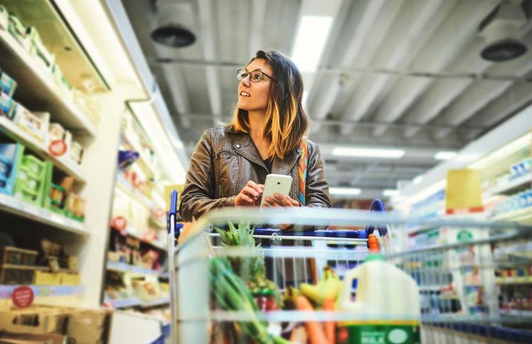 A woman shops in grocery store